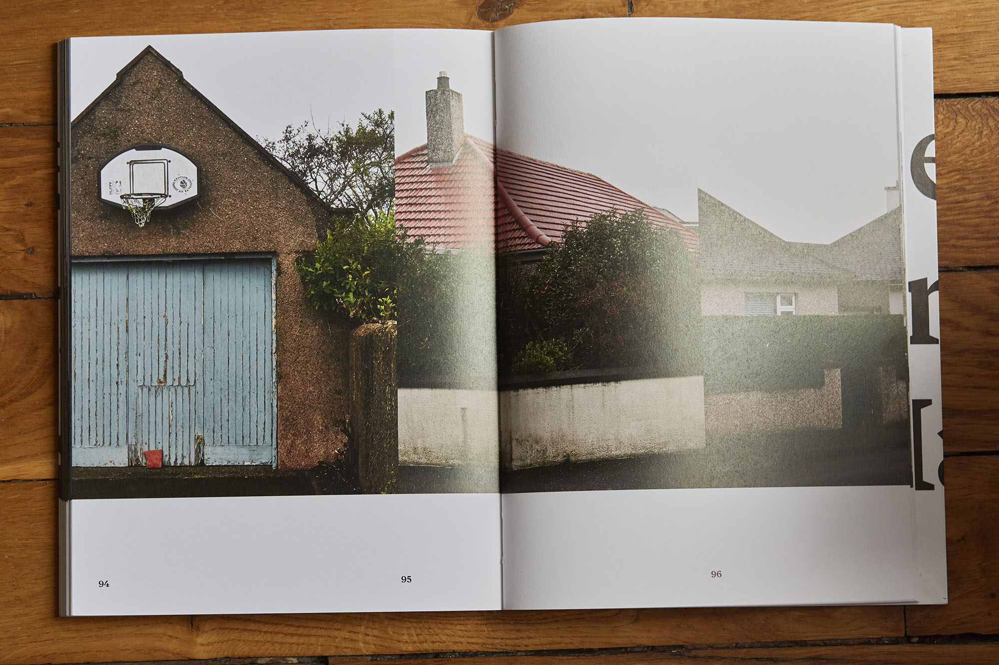 photobook spread from lewis and harris showing everyday architecture and landscape details.
