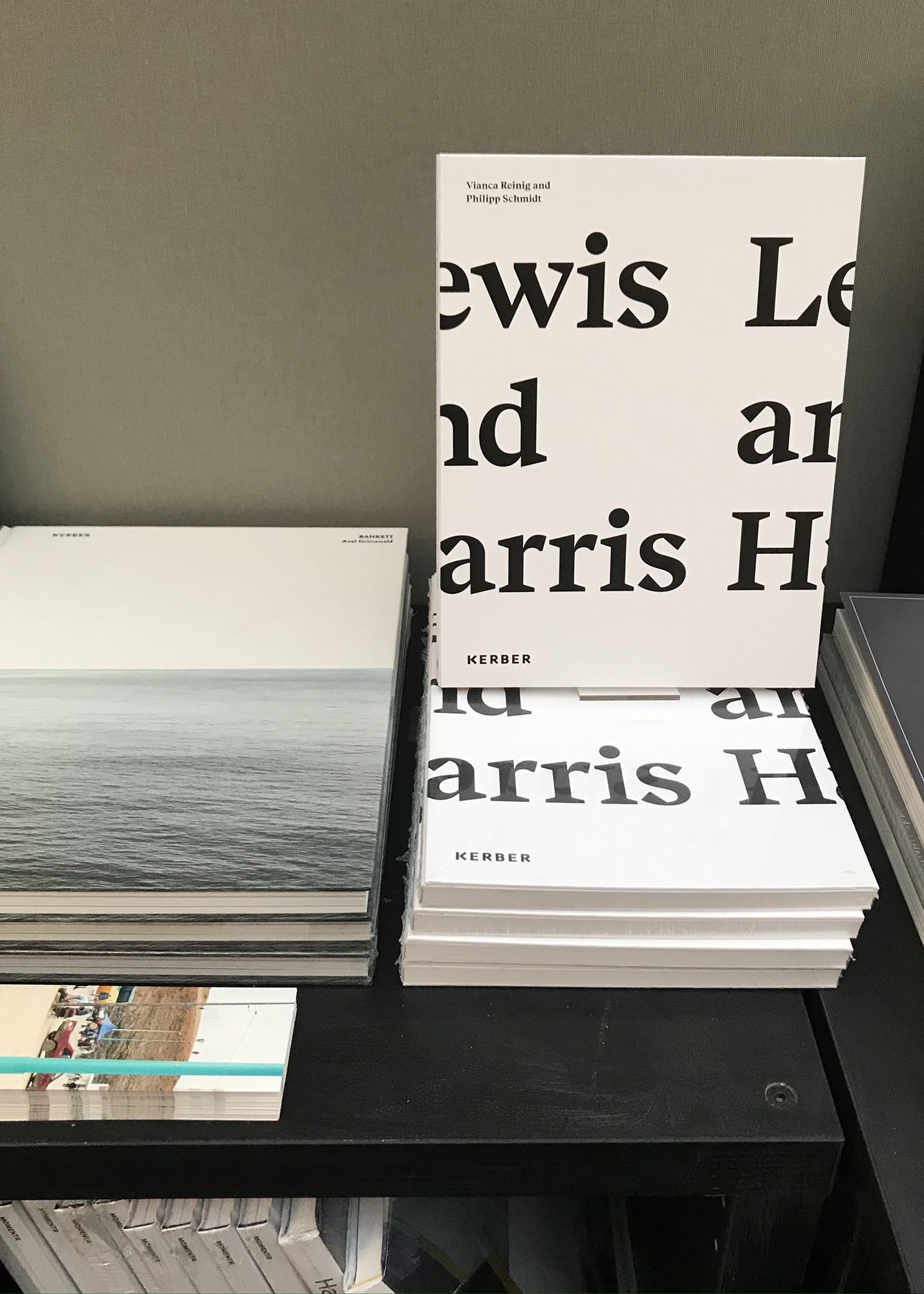 interior view of paris photo 2019 showing the kerber verlag booth featuring the photobook lewis and harris by vianca reinig and philipp schmidt.